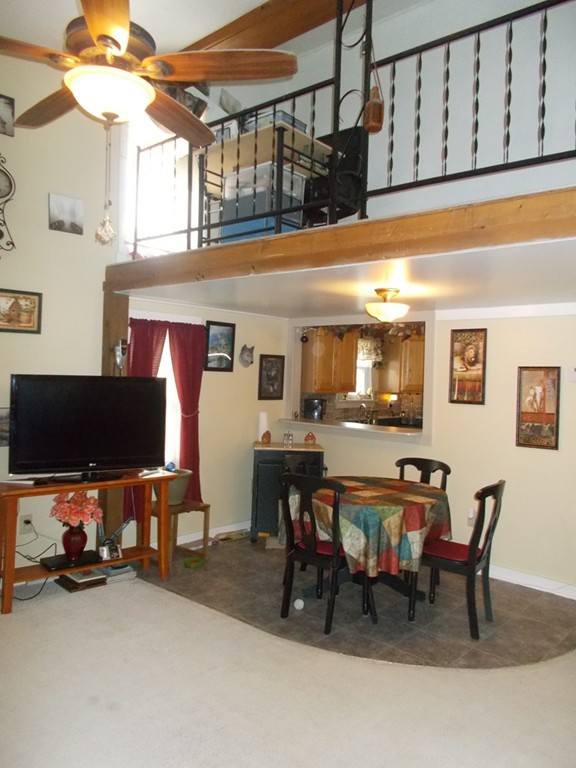 1653 Petersham Road Athol, MA 01331 - Photo 3 of 9 a view of a livingroom with furniture and a flat screen tv