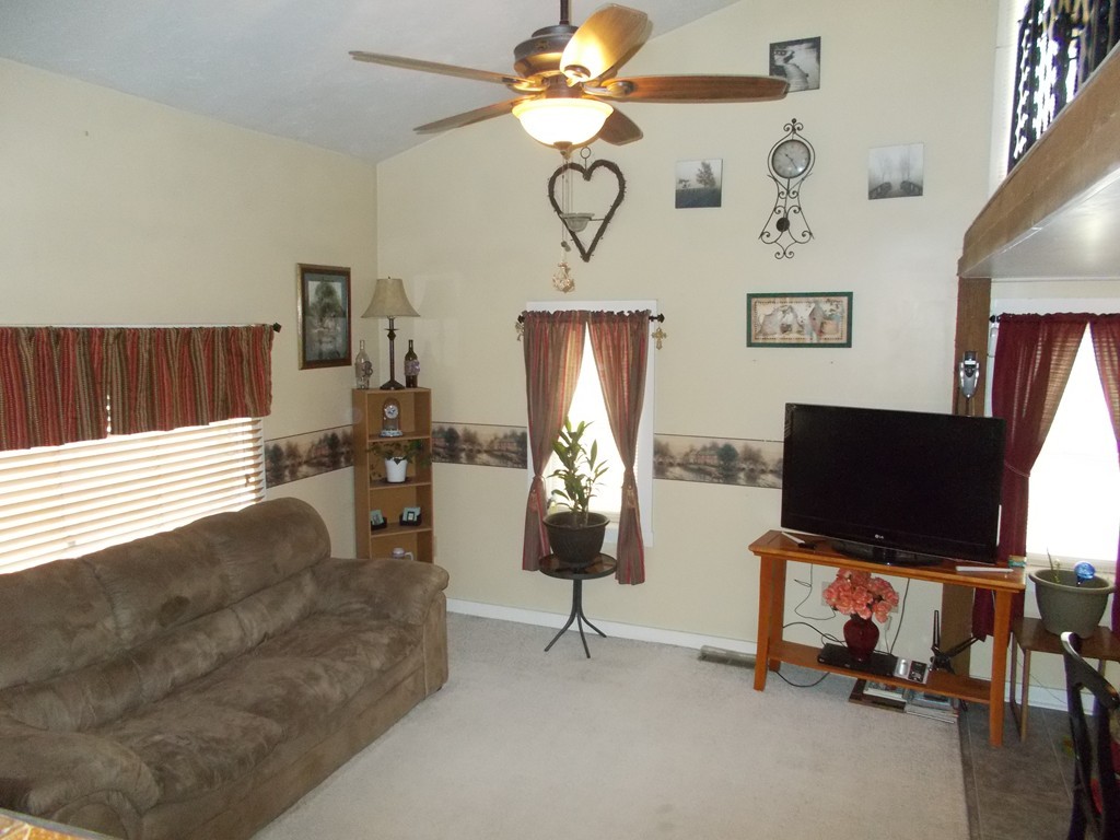 1653 Petersham Road Athol, MA 01331 - Photo 4 of 9 a living room with furniture and a flat screen tv