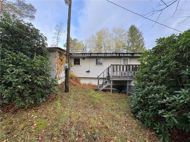 a view of a backyard with a garden