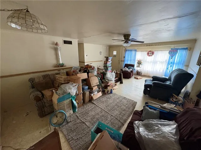 a kitchen with a sink appliances and cabinets