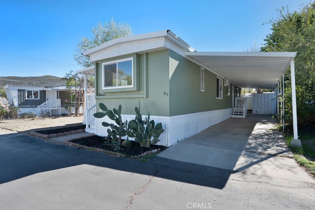 26455 Paradise Valley Road, Unit 85 Warner Springs, CA 92086 - Photo 36 of 36 a front view of a house with garden