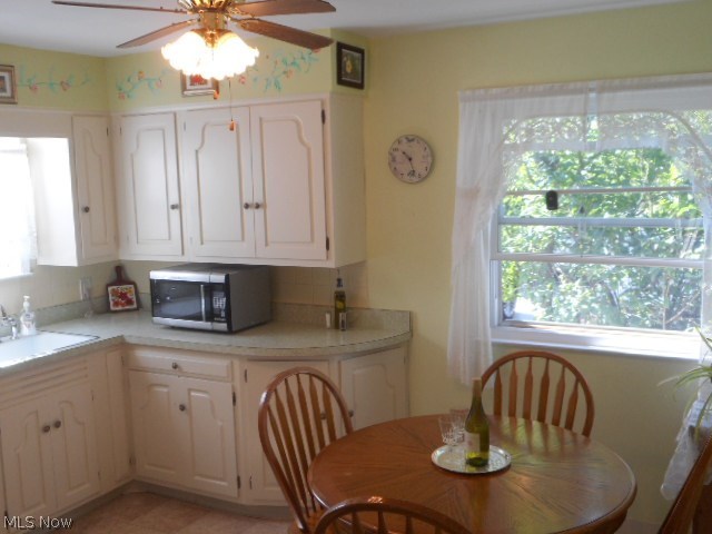 15712 Turney Road Maple Heights, OH 44137 - Photo 5 of 19 EAT-IN KITCHEN WITH TWO WINDOWS.
