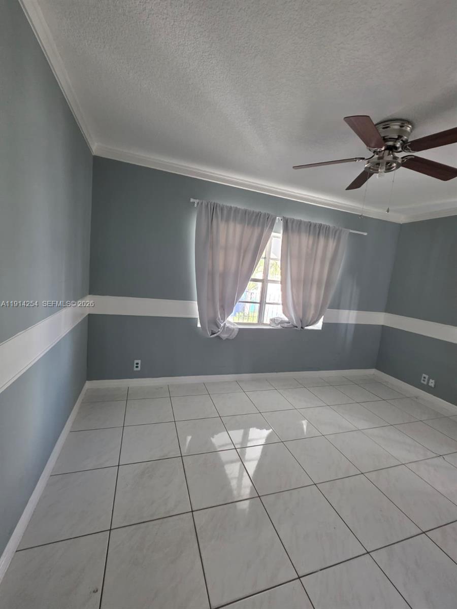 2970 Southwest 17th Street Miami, FL 33145 - Photo 17 of 27 a view of an empty room with a window