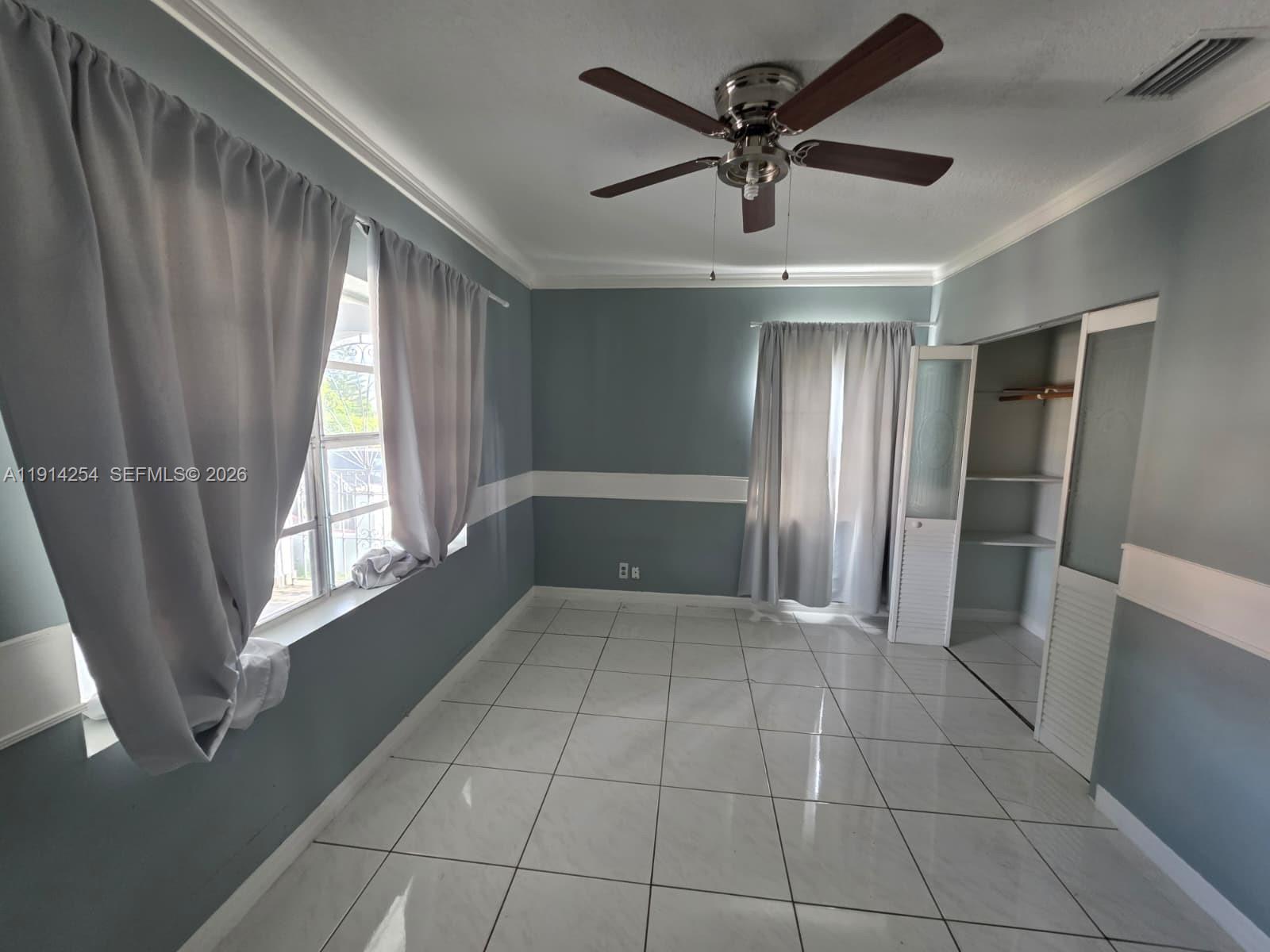 2970 Southwest 17th Street Miami, FL 33145 - Photo 18 of 27 a view of an empty room with a window