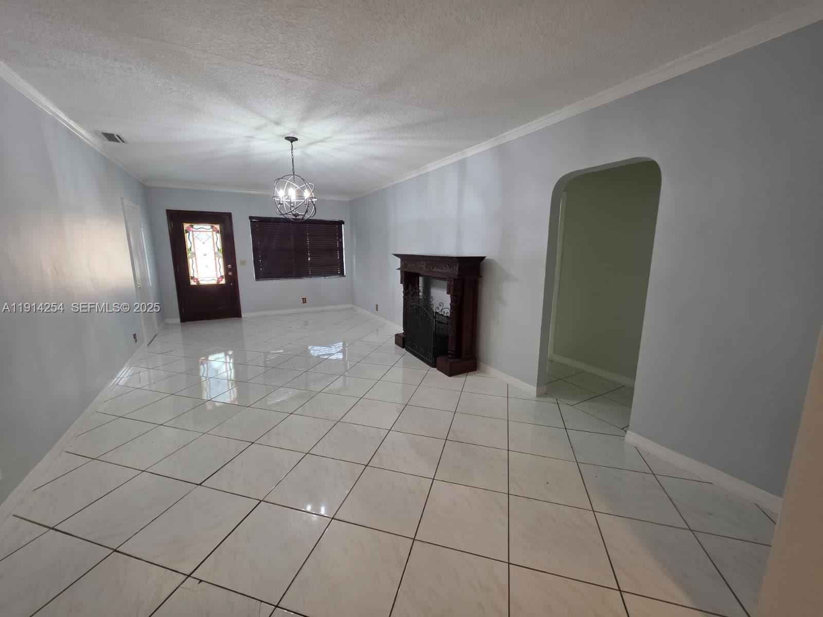 2970 Southwest 17th Street Miami, FL 33145 - Photo 23 of 25 a view of a livingroom with a fireplace
