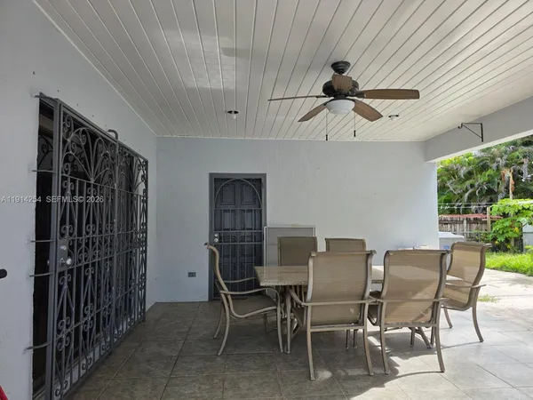 a view of a dining room with furniture