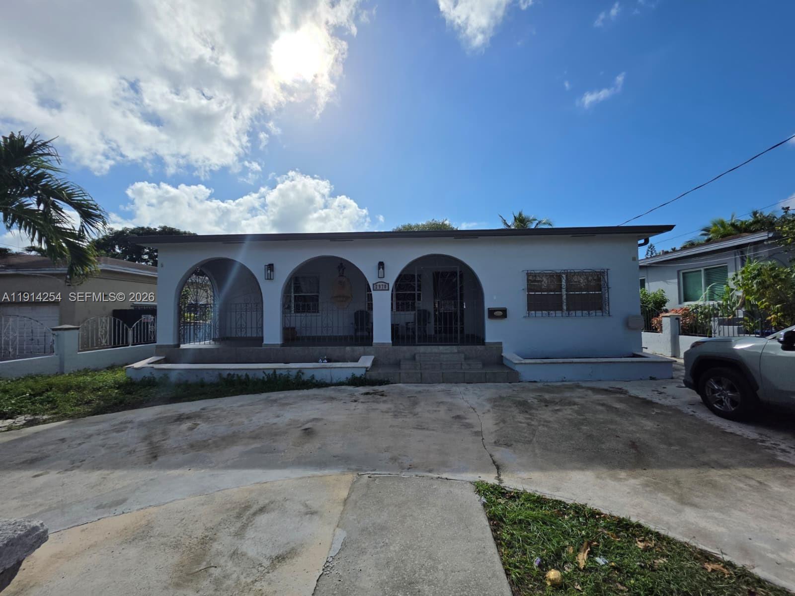 2970 Southwest 17th Street Miami, FL 33145 - Photo 5 of 27 a house view with a backyard space