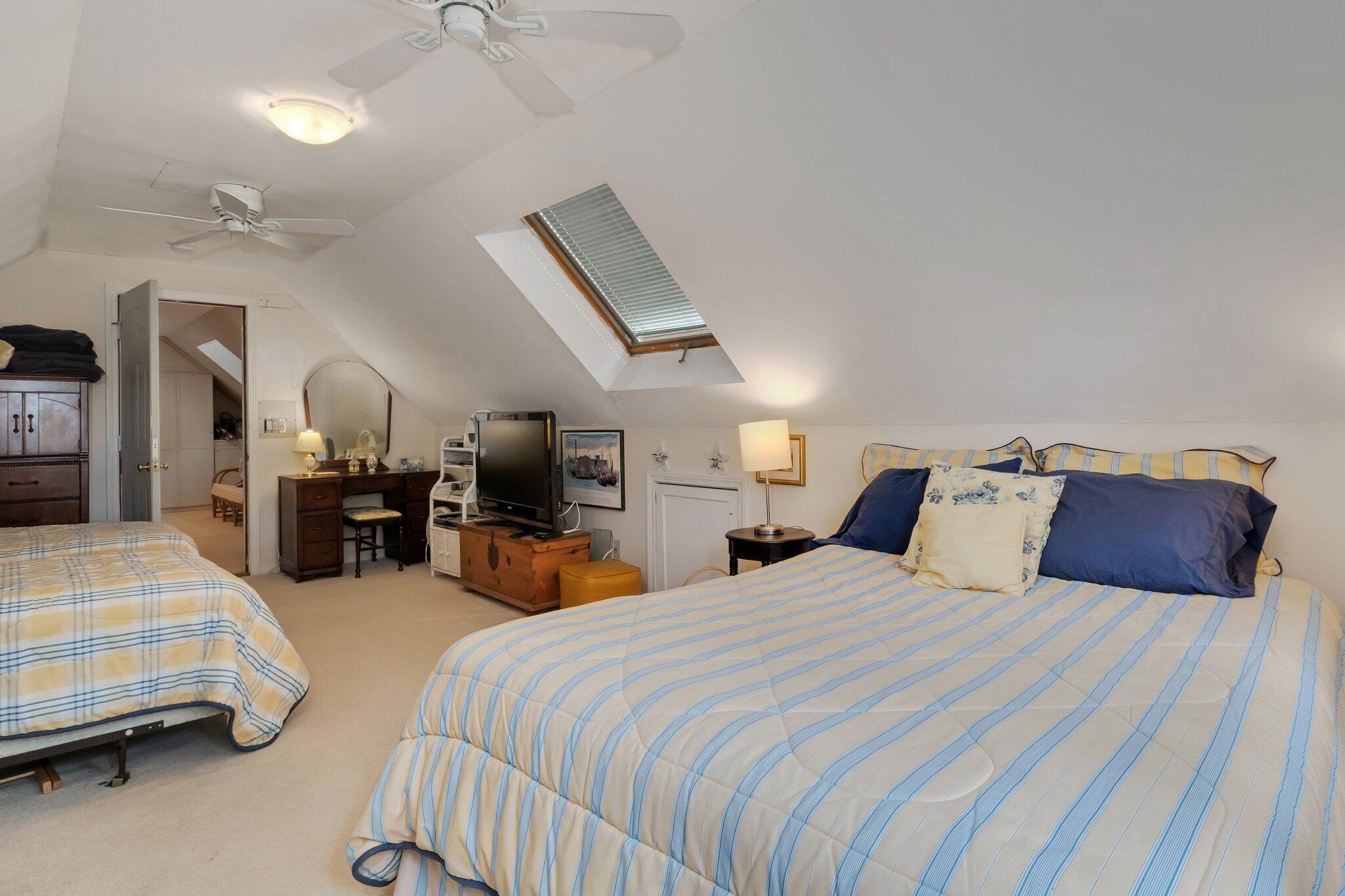 107 Clipper Way Brewster, MA 02631 - Photo 31 of 60 a bedroom with bed and window