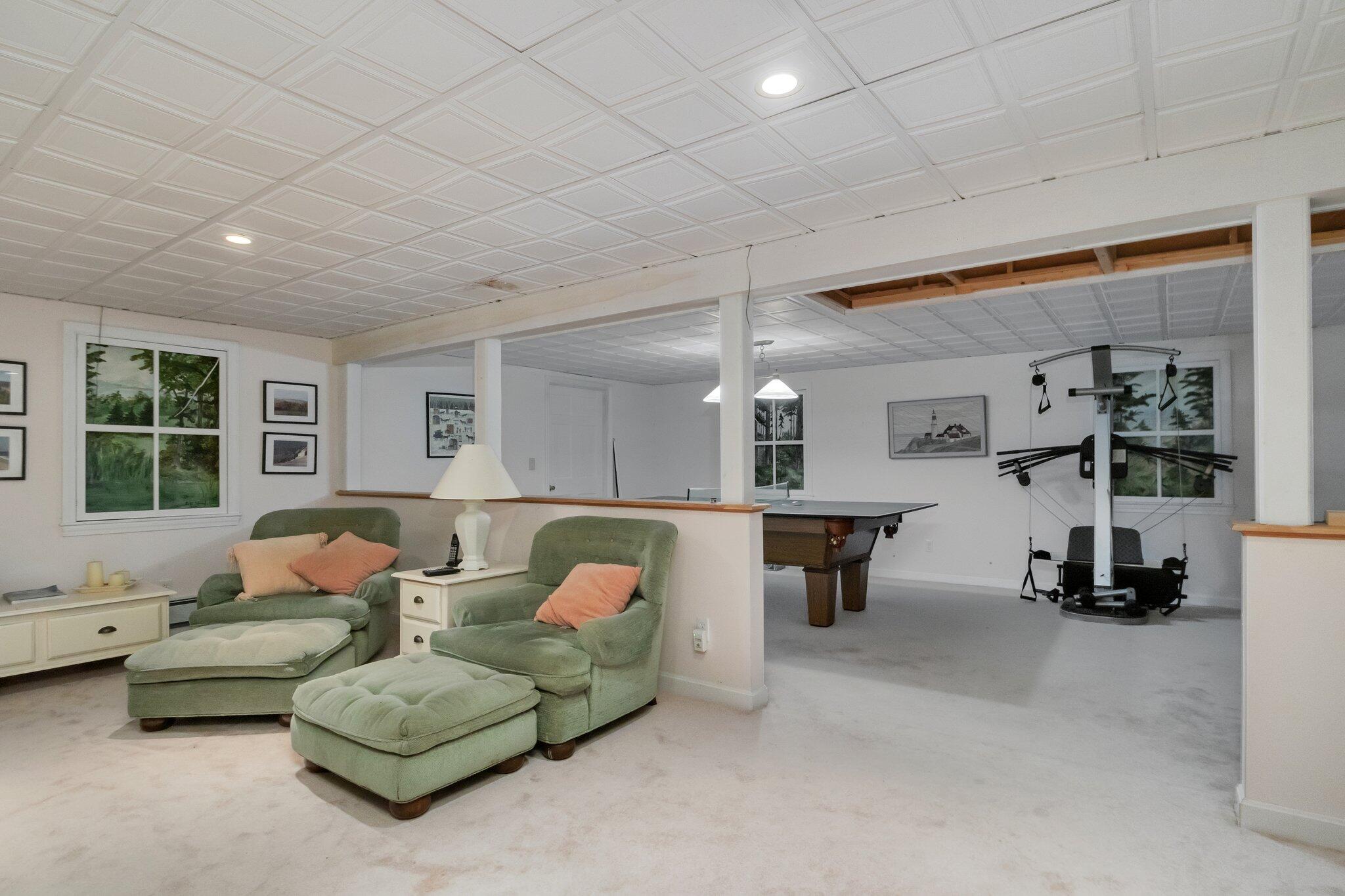 107 Clipper Way Brewster, MA 02631 - Photo 36 of 60 a living room with furniture and a window