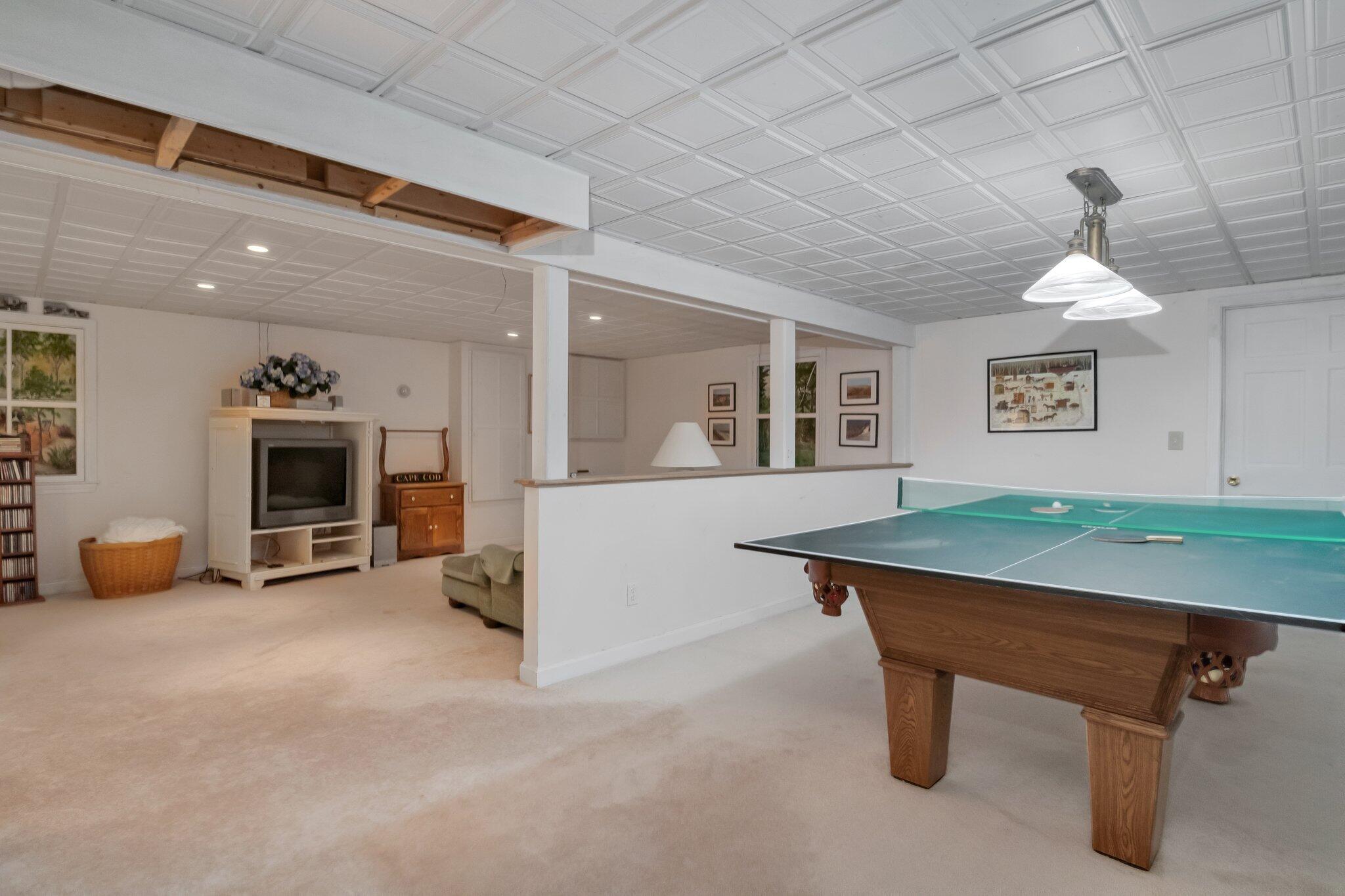 107 Clipper Way Brewster, MA 02631 - Photo 37 of 60 a room with furniture