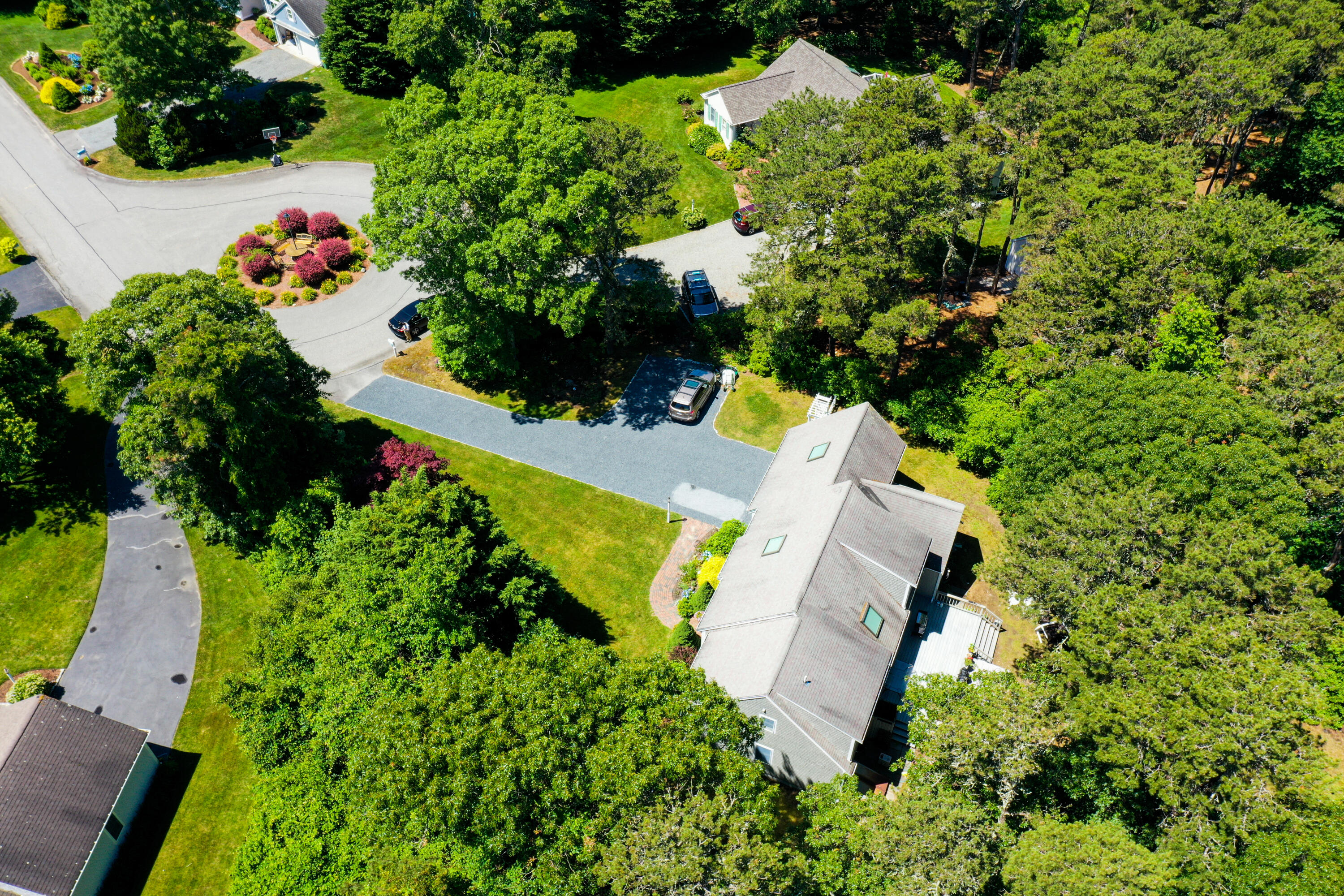 107 Clipper Way Brewster, MA 02631 - Photo 48 of 60 an aerial view of a house with a yard and lake view