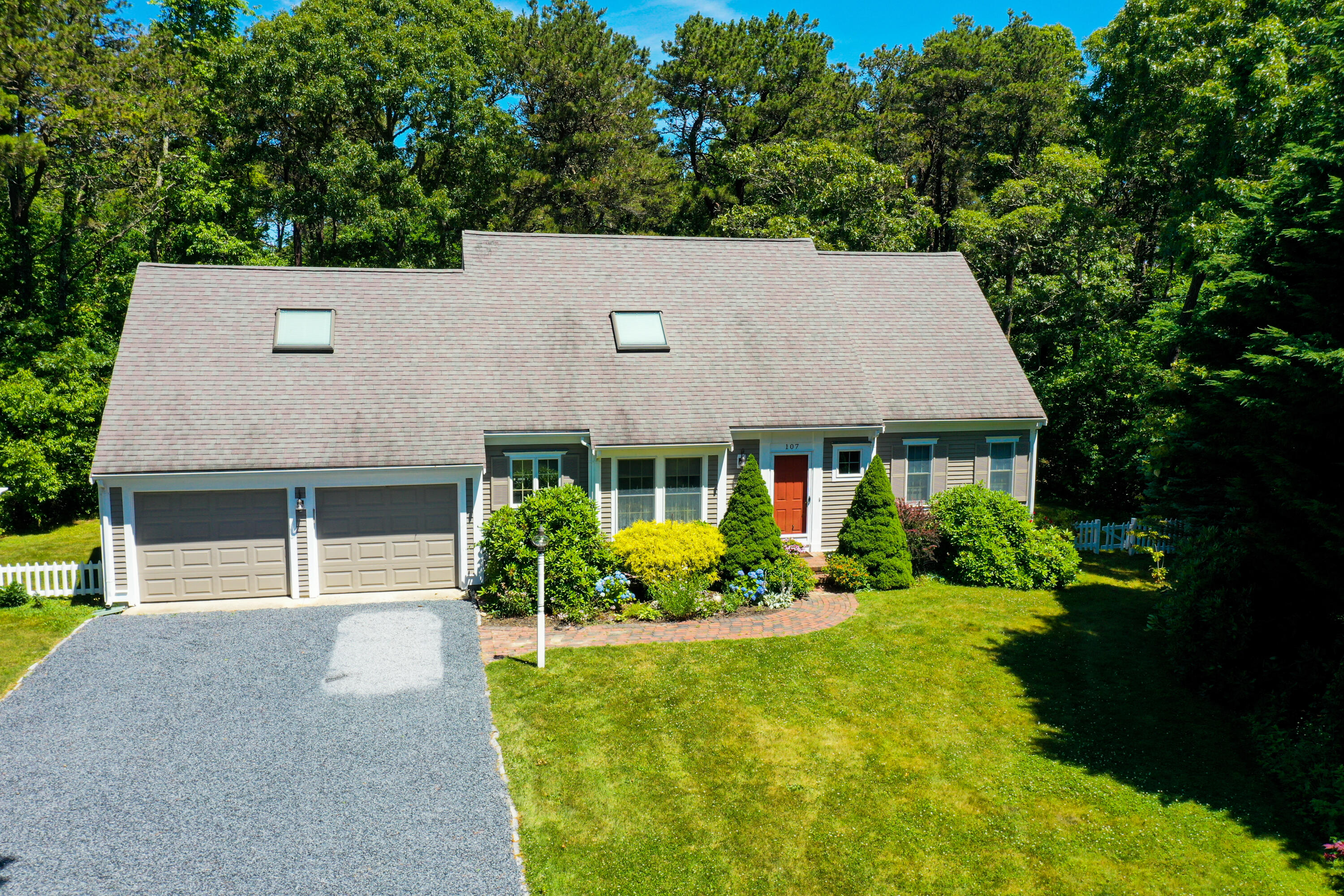 107 Clipper Way Brewster, MA 02631 - Photo 55 of 60 front view of a house with a yard