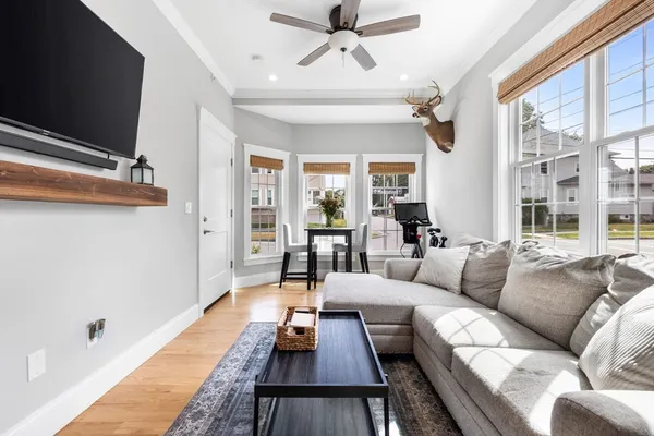 a living room with furniture or couch and a flat screen tv