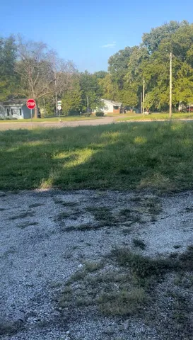 a view of an outdoor space and a yard