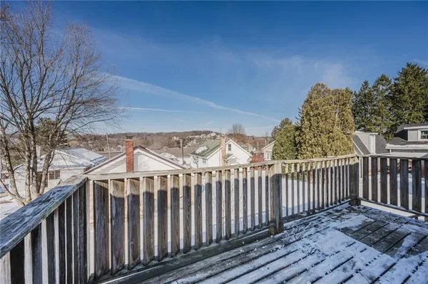 a view of a wooden fence