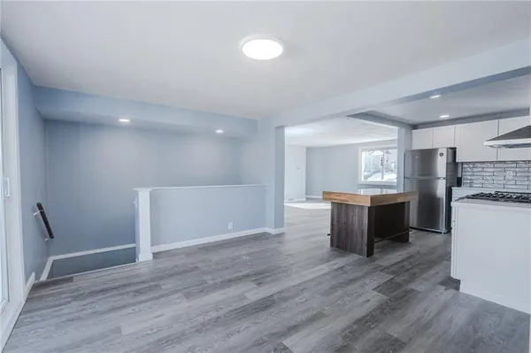a view of kitchen with breakfast area