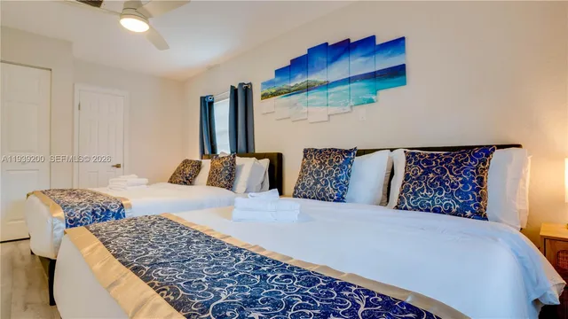 a bedroom with a bed and a couch