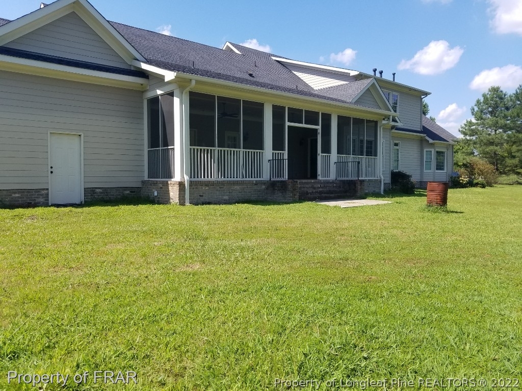 525 Rob Road Stedman, NC 28391 - Photo 2 of 23 a view of a house with a yard and sitting area