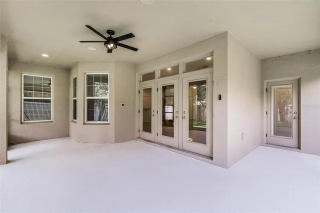 a view of livingroom with hardwood floor and ceiling fan