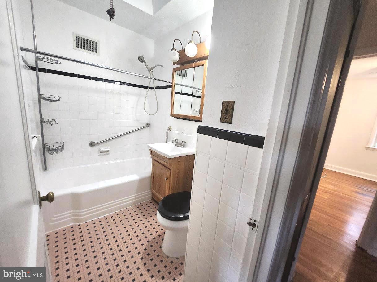 443 Pleasant Street Philadelphia, PA 19119 - Photo 11 of 13 a bathroom with a bathtub and a shower