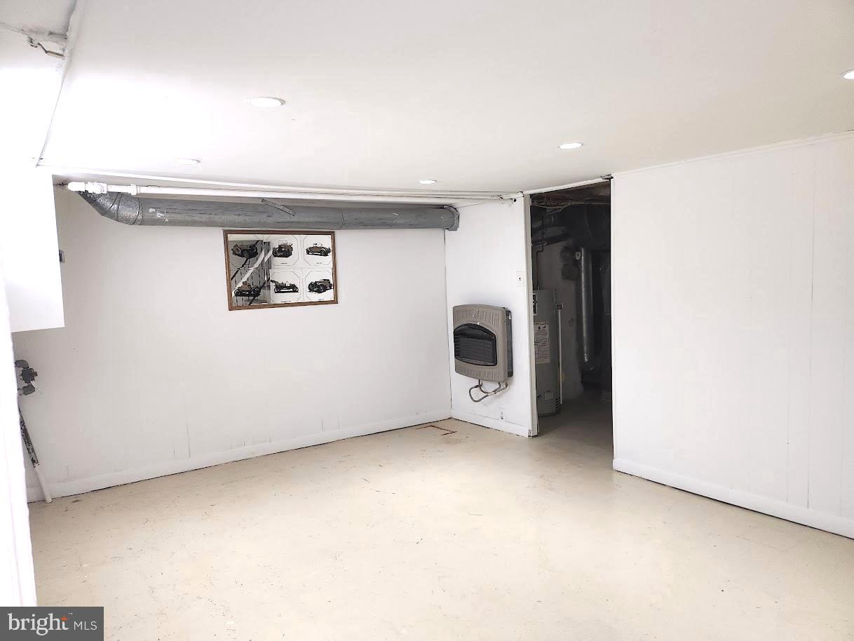 443 Pleasant Street Philadelphia, PA 19119 - Photo 12 of 13 a view of an empty room with a window