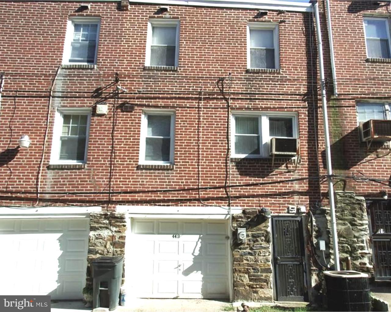 443 Pleasant Street Philadelphia, PA 19119 - Photo 13 of 13 a front view of a building with glass windows