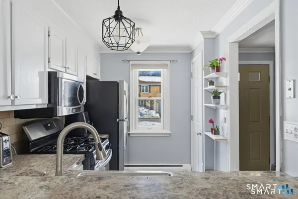 a view of a livingroom with furniture