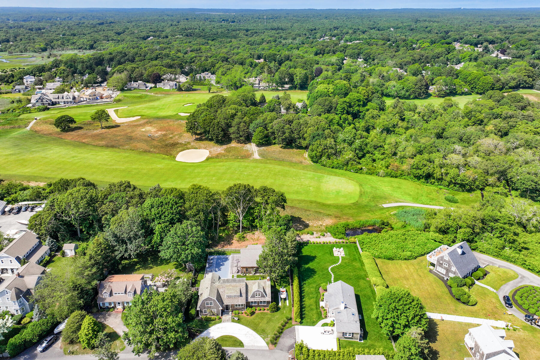 38 Crosby Circle Osterville, MA 02655 - Photo 2 of 28 an aerial view of residential houses with outdoor space and trees