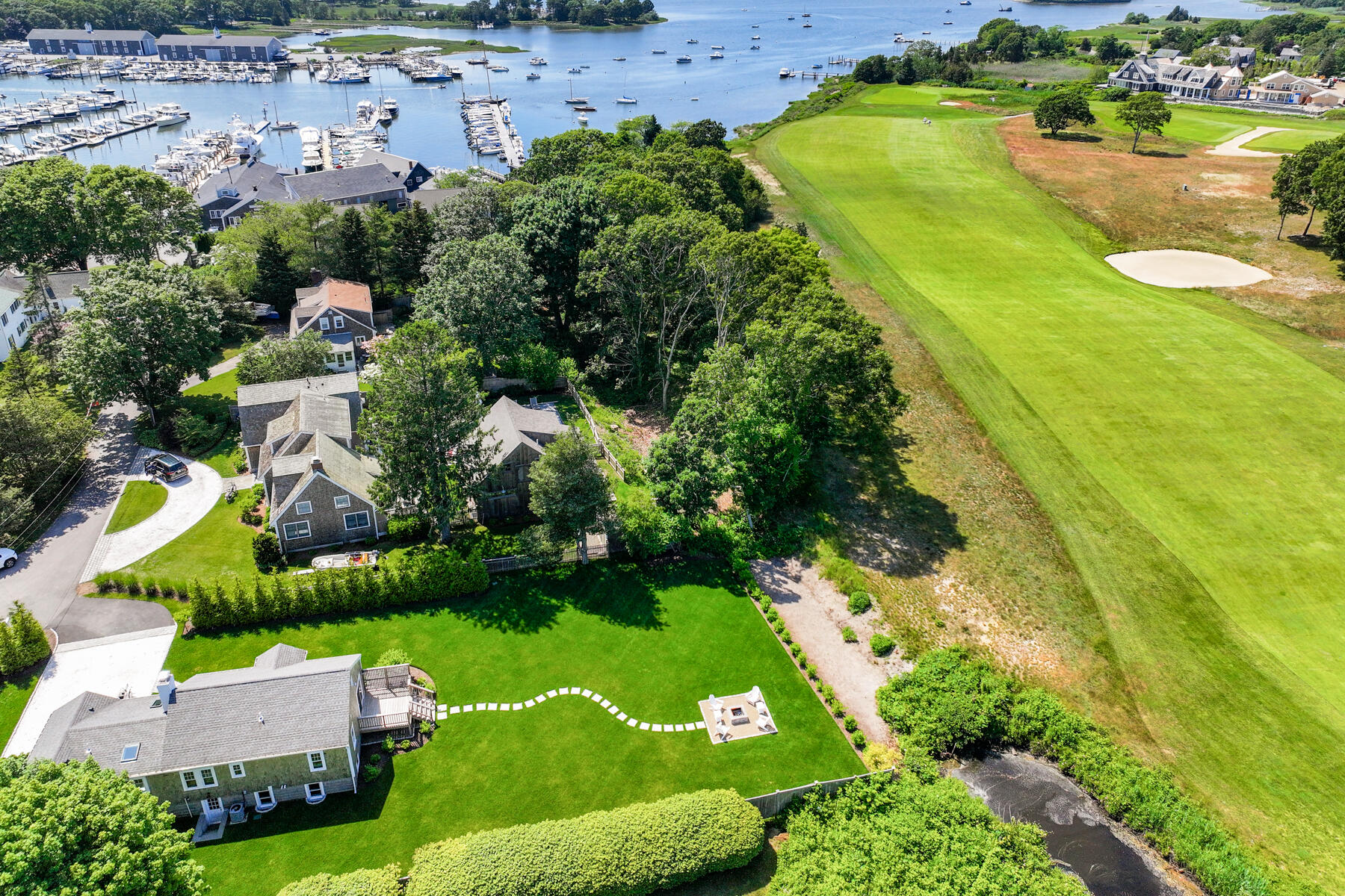 38 Crosby Circle Osterville, MA 02655 - Photo 25 of 28 an aerial view of a house with a garden and lake view