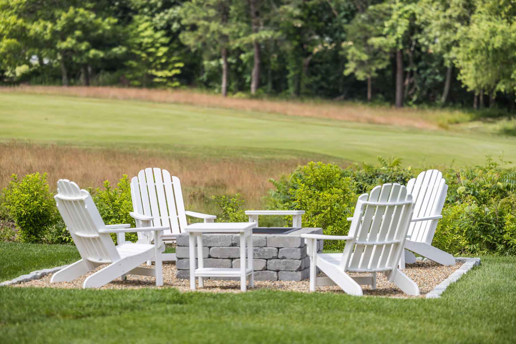 38 Crosby Circle Osterville, MA 02655 - Photo 3 of 28 a view of a chair and table on the garden