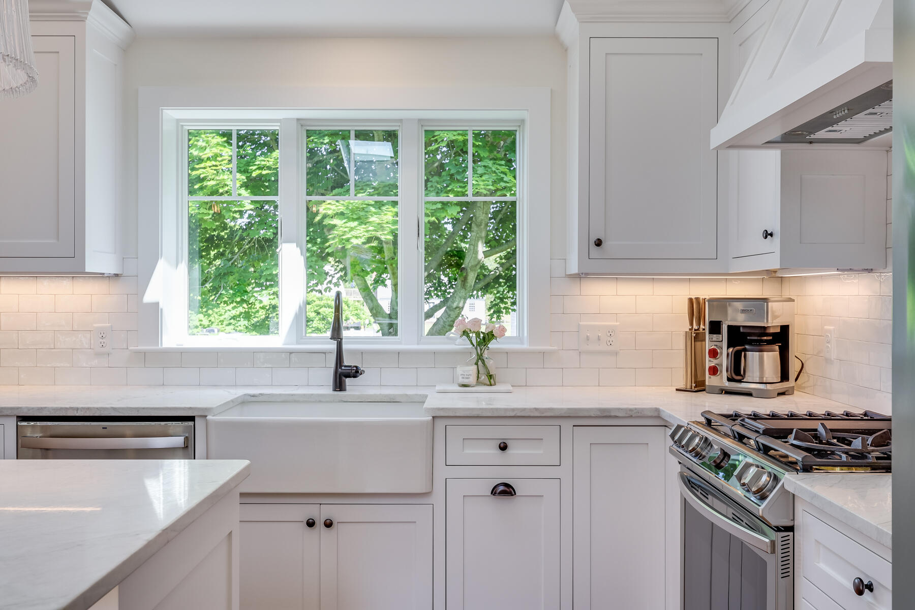 38 Crosby Circle Osterville, MA 02655 - Photo 7 of 28 a kitchen with granite countertop a sink stove and cabinets