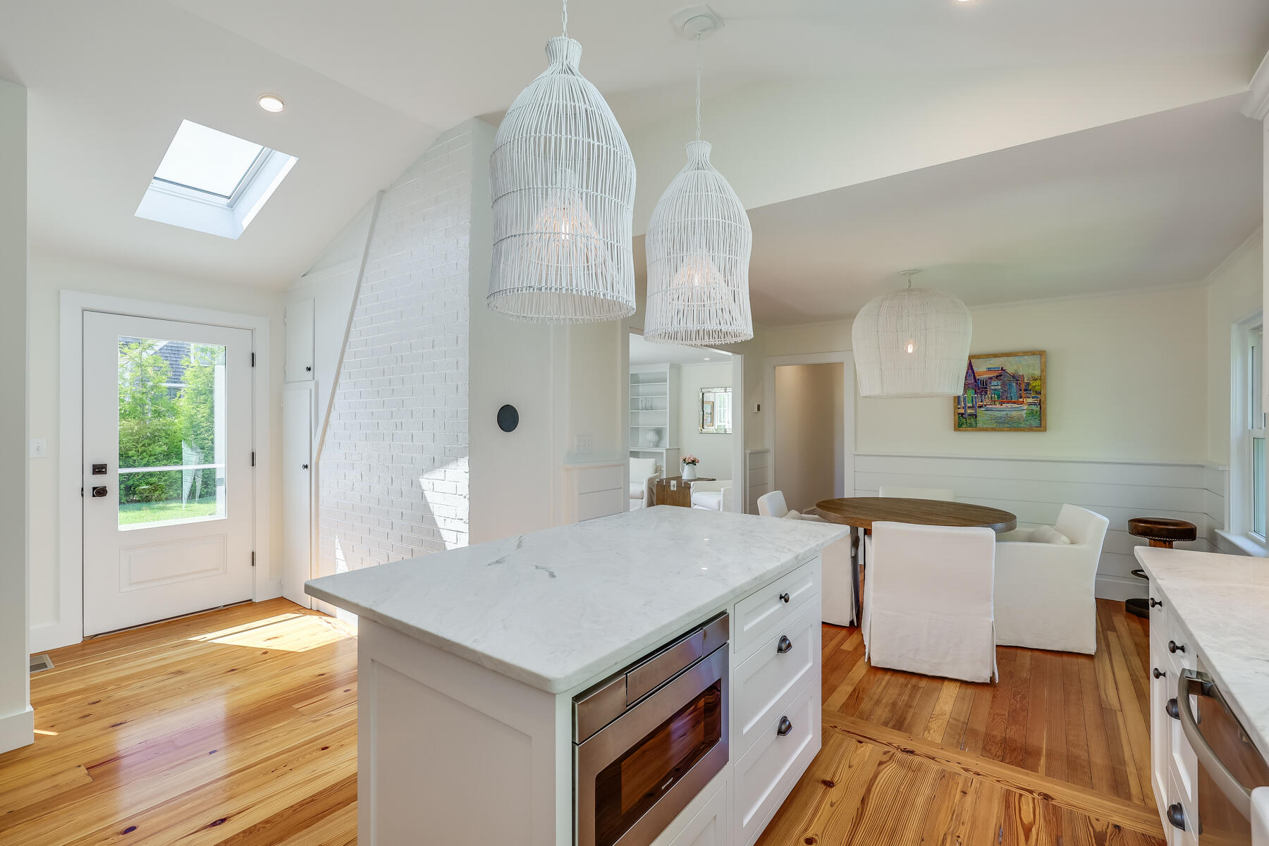 38 Crosby Circle Osterville, MA 02655 - Photo 10 of 28 a view of a kitchen area with furniture and wooden floor