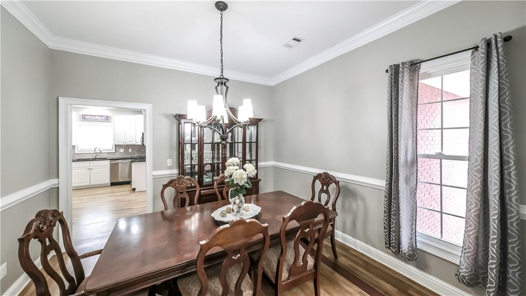 896 Winn Road Douglasville, GA 30134 - Photo 15 of 64 a view of a dining room with furniture window and outside view