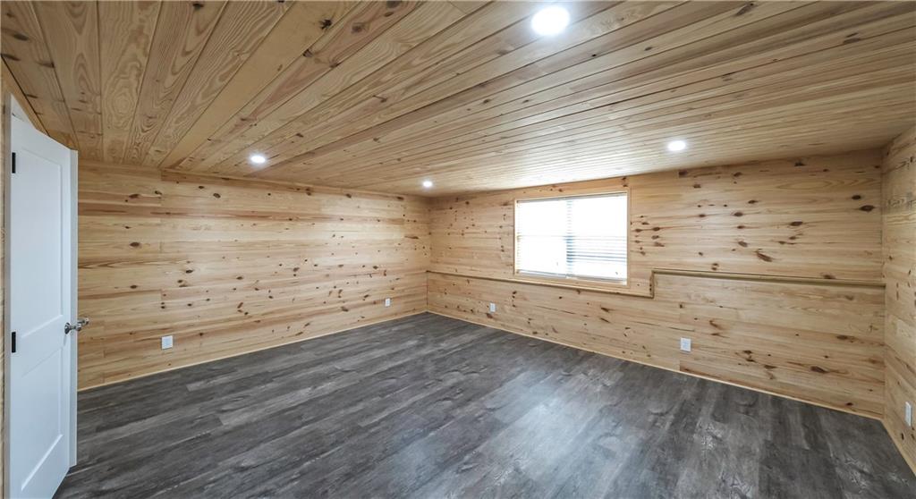 896 Winn Road Douglasville, GA 30134 - Photo 42 of 64 a view of empty room with wooden floor