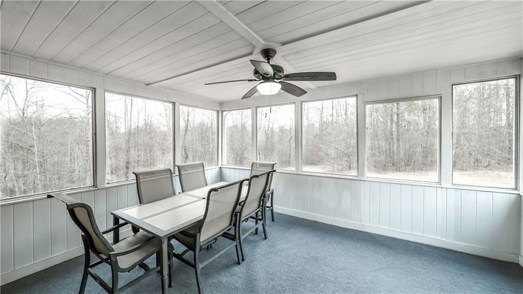 896 Winn Road Douglasville, GA 30134 - Photo 51 of 64 a view of a dining room with furniture window and outside view