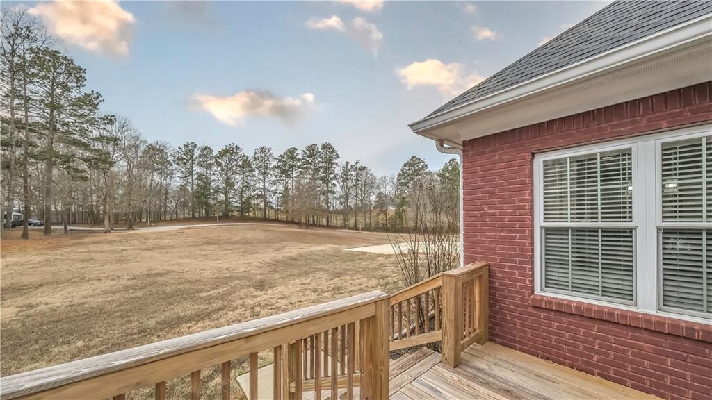 896 Winn Road Douglasville, GA 30134 - Photo 53 of 64 a view of balcony with wooden floor and fence