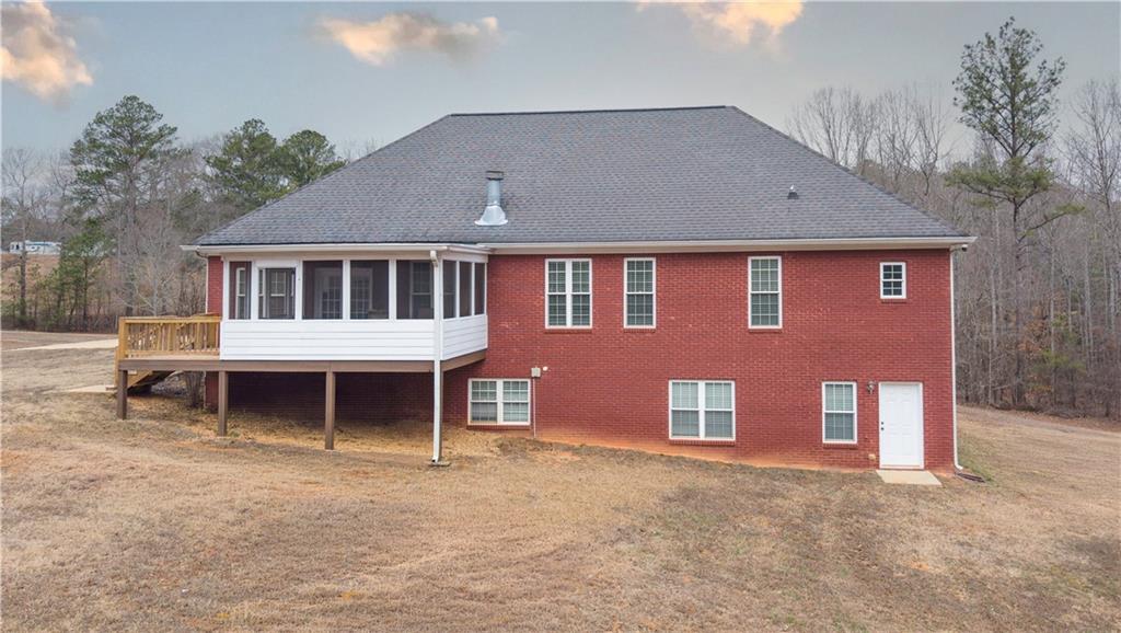 896 Winn Road Douglasville, GA 30134 - Photo 57 of 64 a front view of a house with a yard and garage