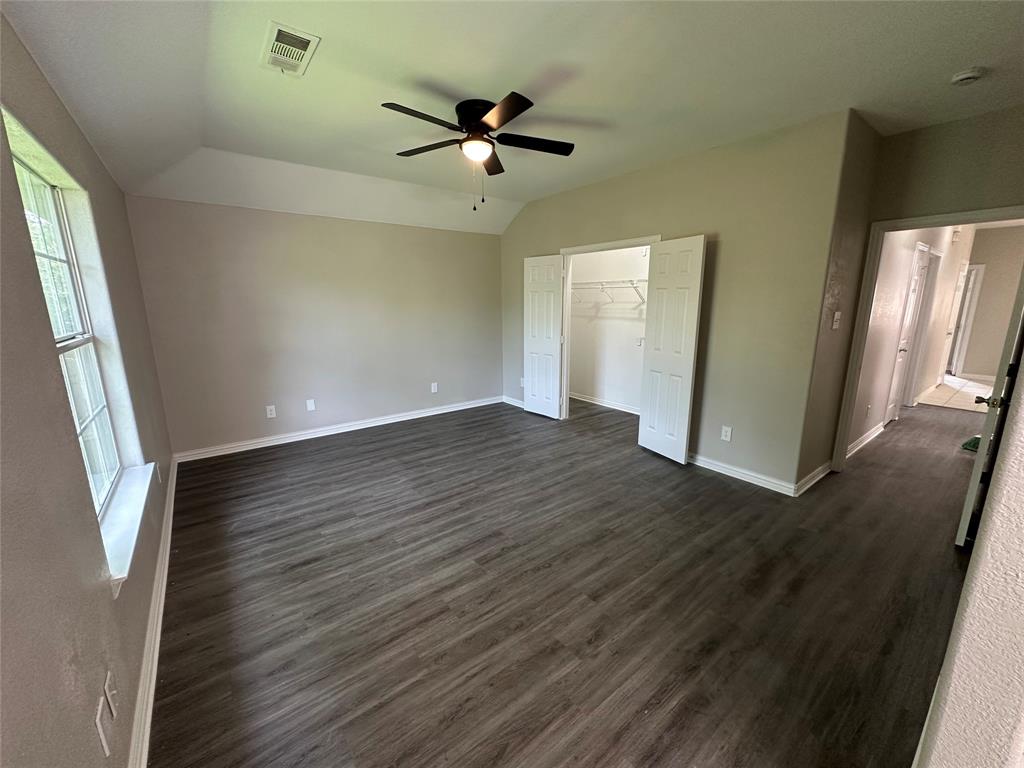 1160 South Beltline Road Dallas, TX 75253 - Photo 15 of 18 wooden floor in an empty room with a window