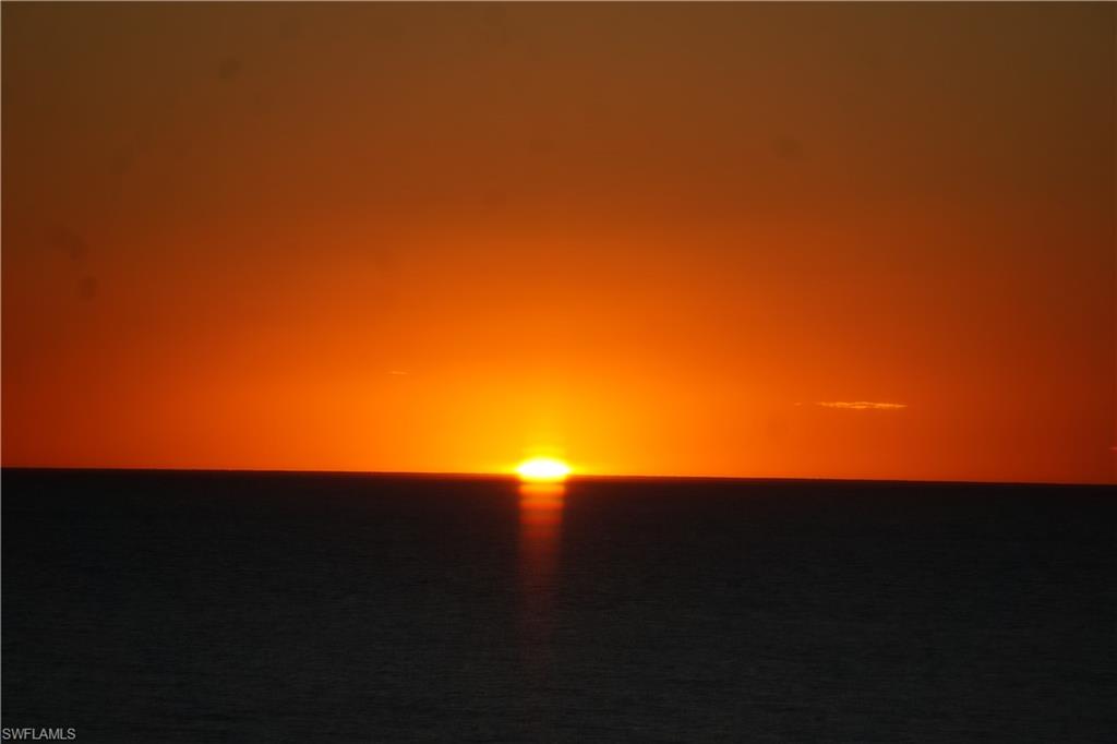 5 Bluebill Avenue, Unit 209 Naples, FL 34108 - Photo 30 of 32 a view of an ocean from a balcony