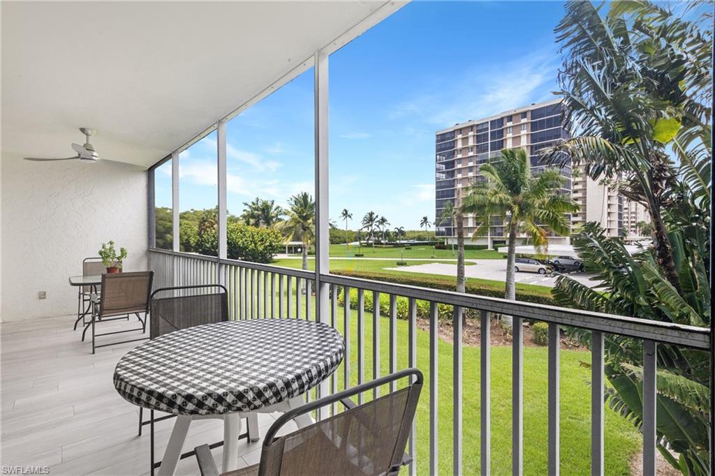 5 Bluebill Avenue, Unit 209 Naples, FL 34108 - Photo 9 of 32 a view of a city from a balcony