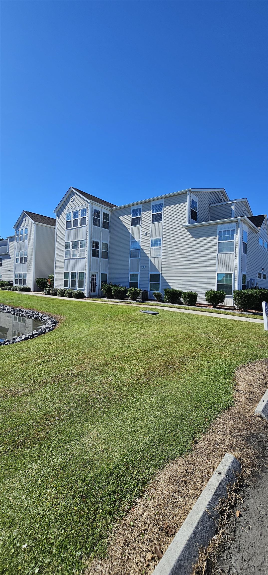 2273 Huntingdon Drive, Unit J Myrtle Beach, SC 29575 - Photo 2 of 24 View of apartment building / complex