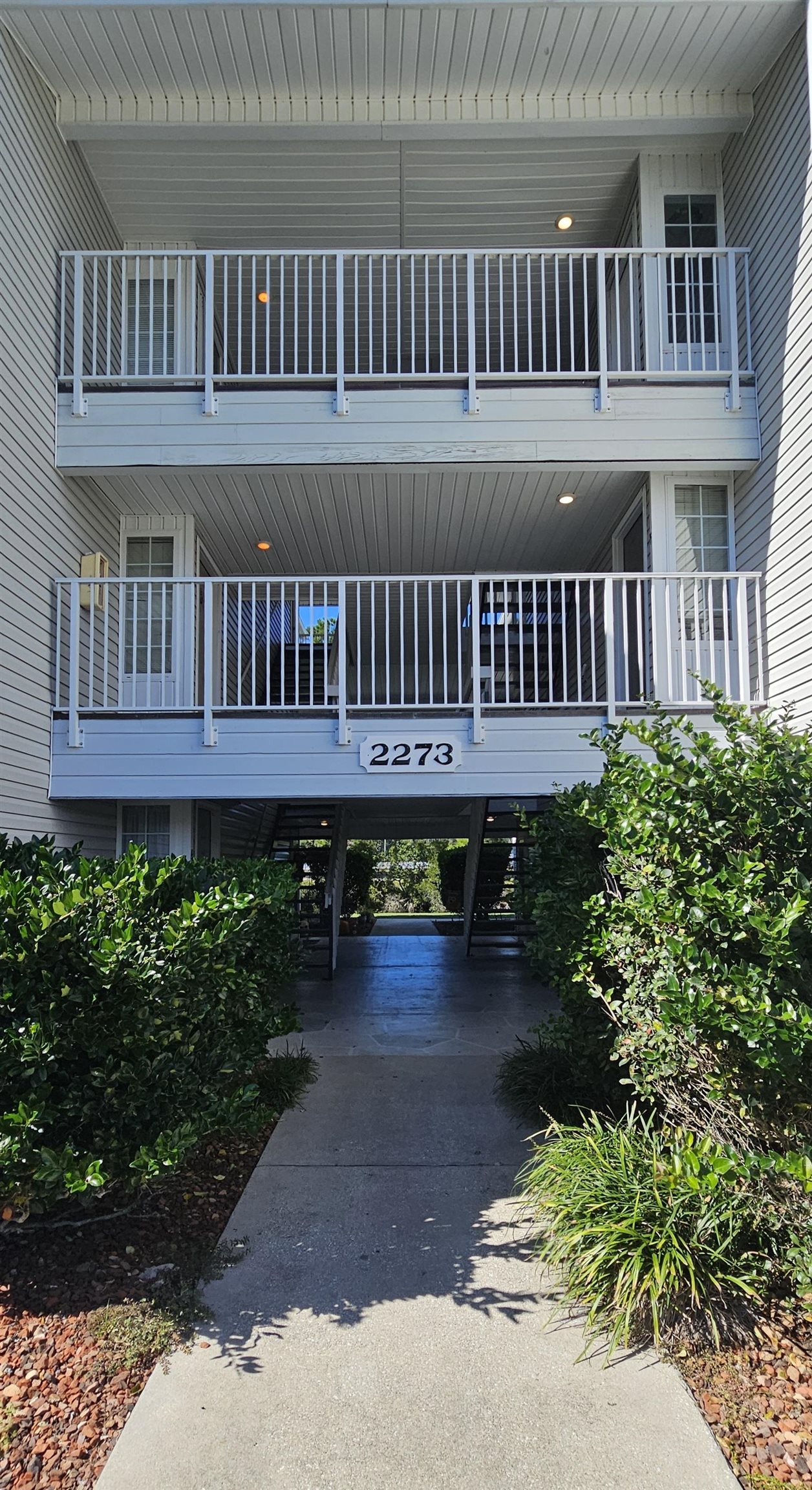 2273 Huntingdon Drive, Unit J Myrtle Beach, SC 29575 - Photo 3 of 24 View of community with a carport and a balcony