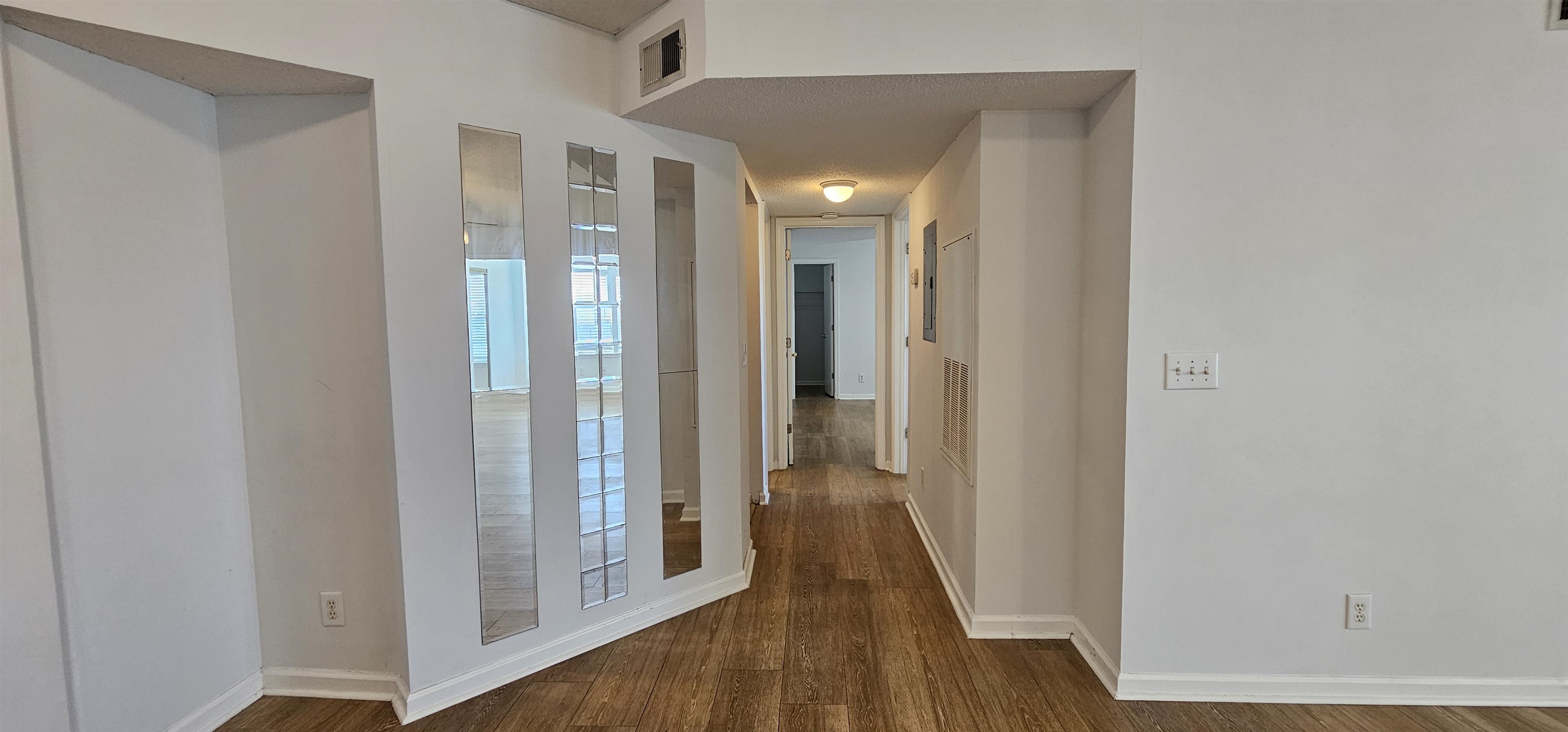 2273 Huntingdon Drive, Unit J Myrtle Beach, SC 29575 - Photo 10 of 24 Hallway featuring baseboards and dark wood finished floors