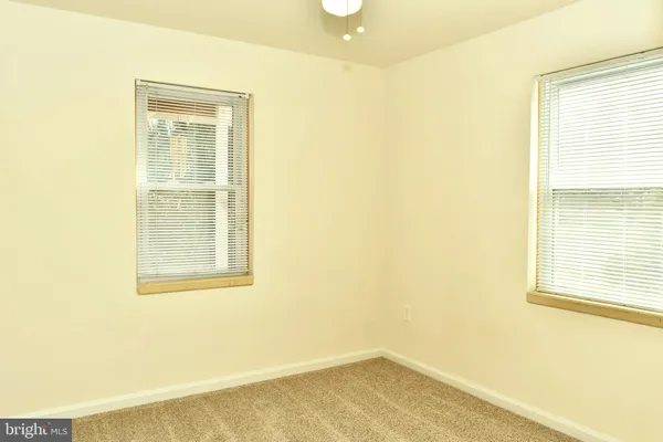 a very nice looking room with wooden walls