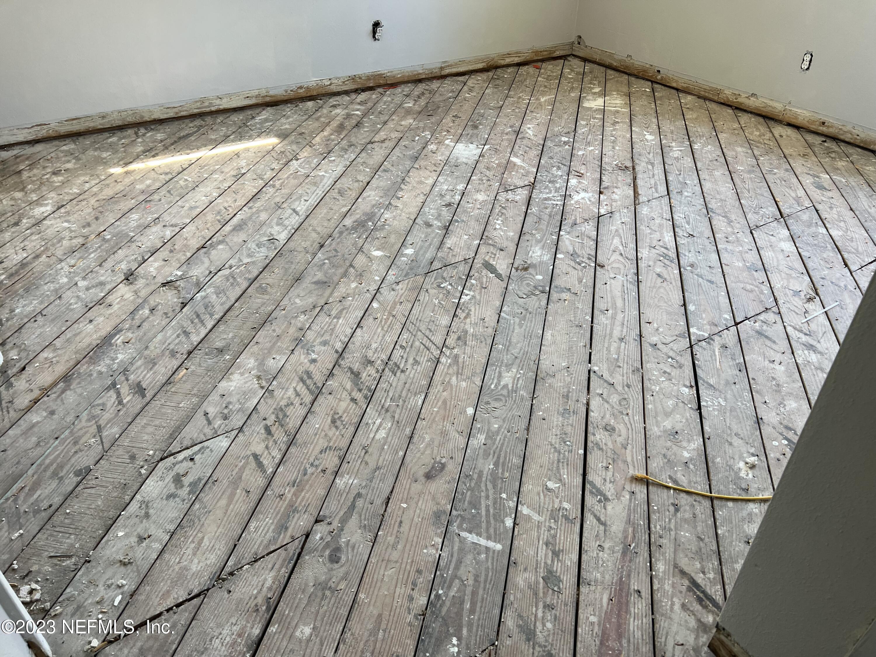 6519 Champlain Road Jacksonville, FL 32208 - Photo 4 of 4 a view of wooden floor in a room