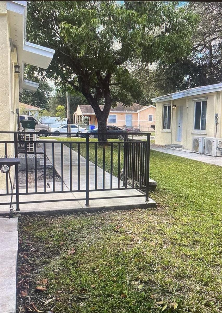 7637 Northwest 3rd Avenue, Unit 1 Miami, FL 33150 - Photo 17 of 20 a house view with a garden space