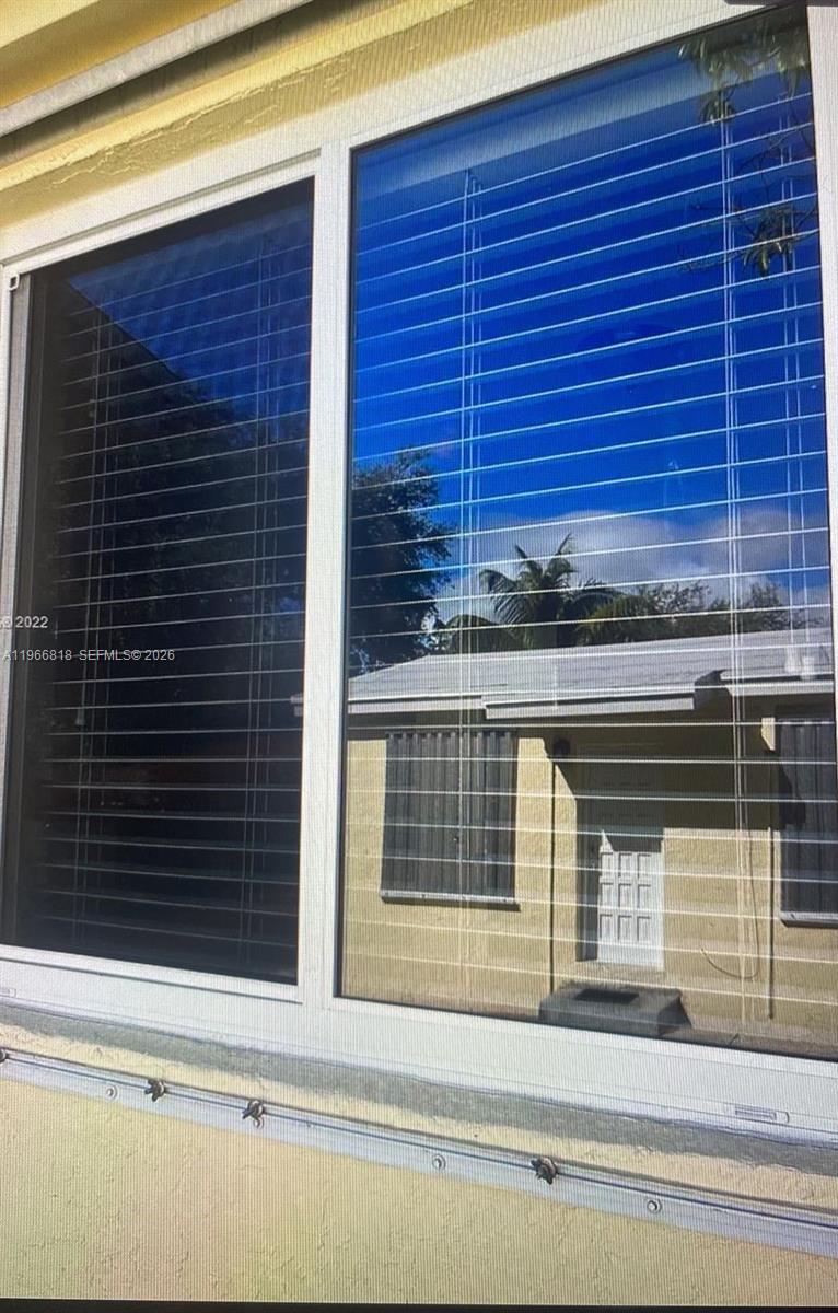 7637 Northwest 3rd Avenue, Unit 1 Miami, FL 33150 - Photo 19 of 20 a view of entrance door of the house