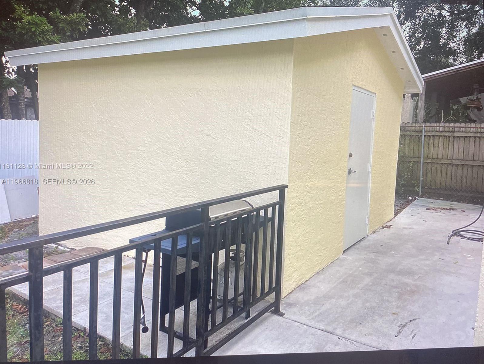 7637 Northwest 3rd Avenue, Unit 1 Miami, FL 33150 - Photo 20 of 20 a view of balcony with wooden floor