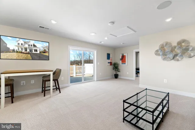 a bedroom with furniture and window