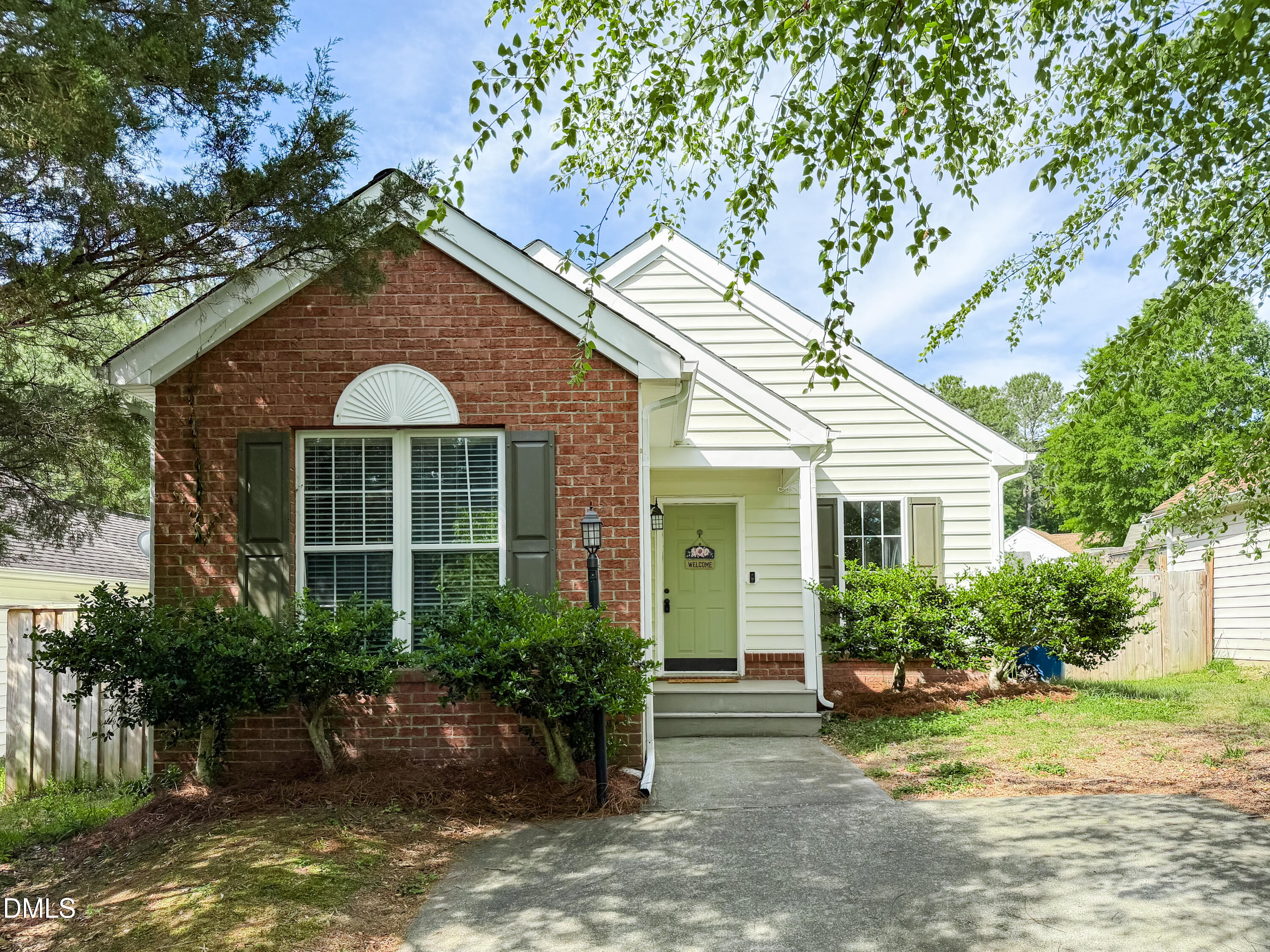 6304 Forest Ridge Drive Durham, NC 27713 - Photo 1 of 29 a front view of a house with garden